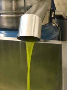 The oil with the typical extra virgin color. 
